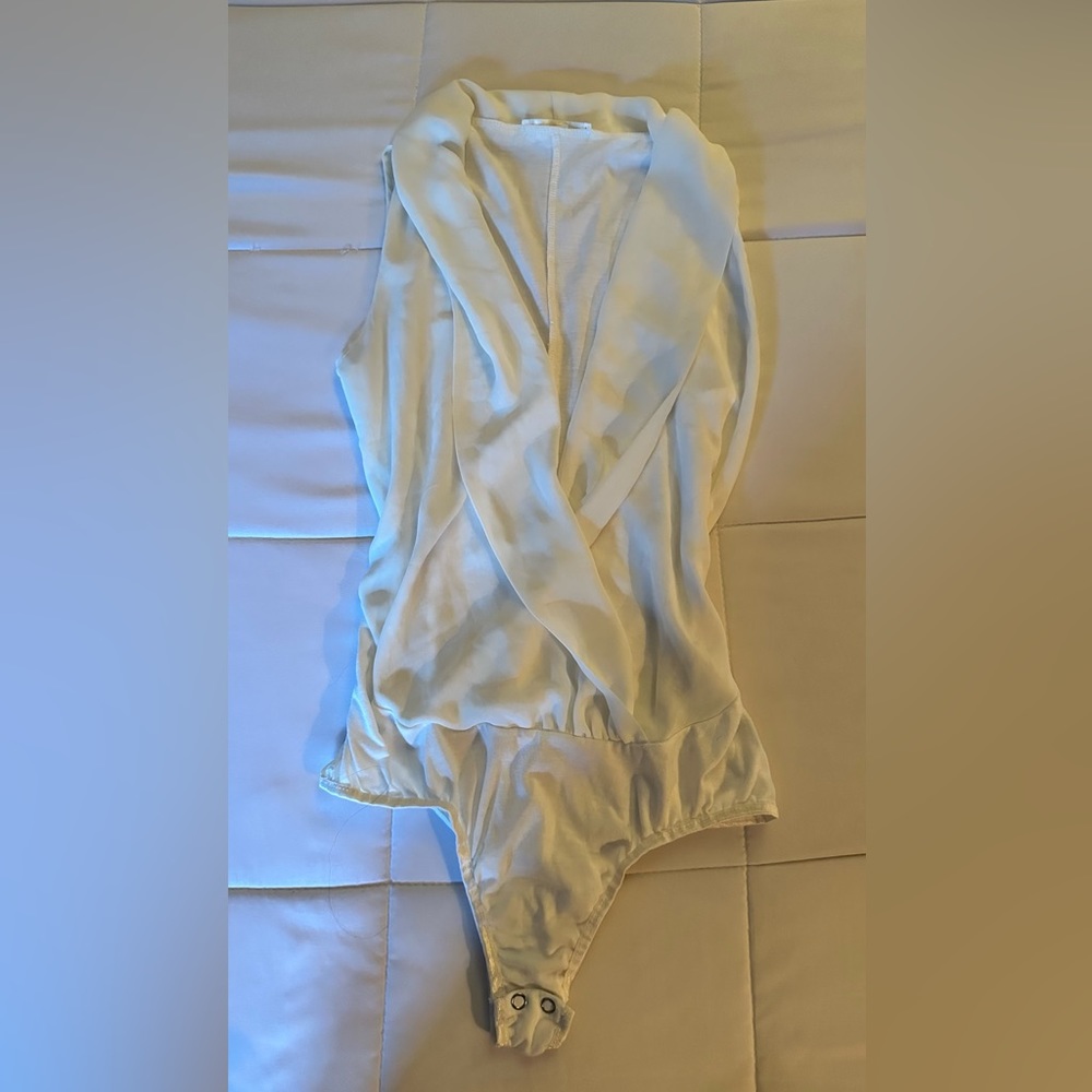 White, small, Neck plunging chiffon body suit. Worn once, in perfect condition